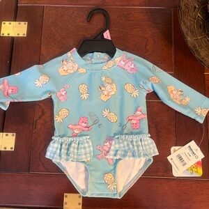 Swimsuit with Care Bear and Pineapple Design